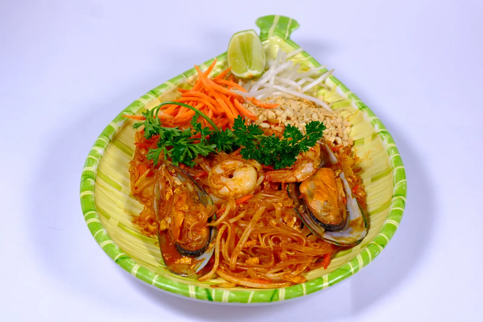 Thai stir-fried rice noodles with shrimp and vegetables